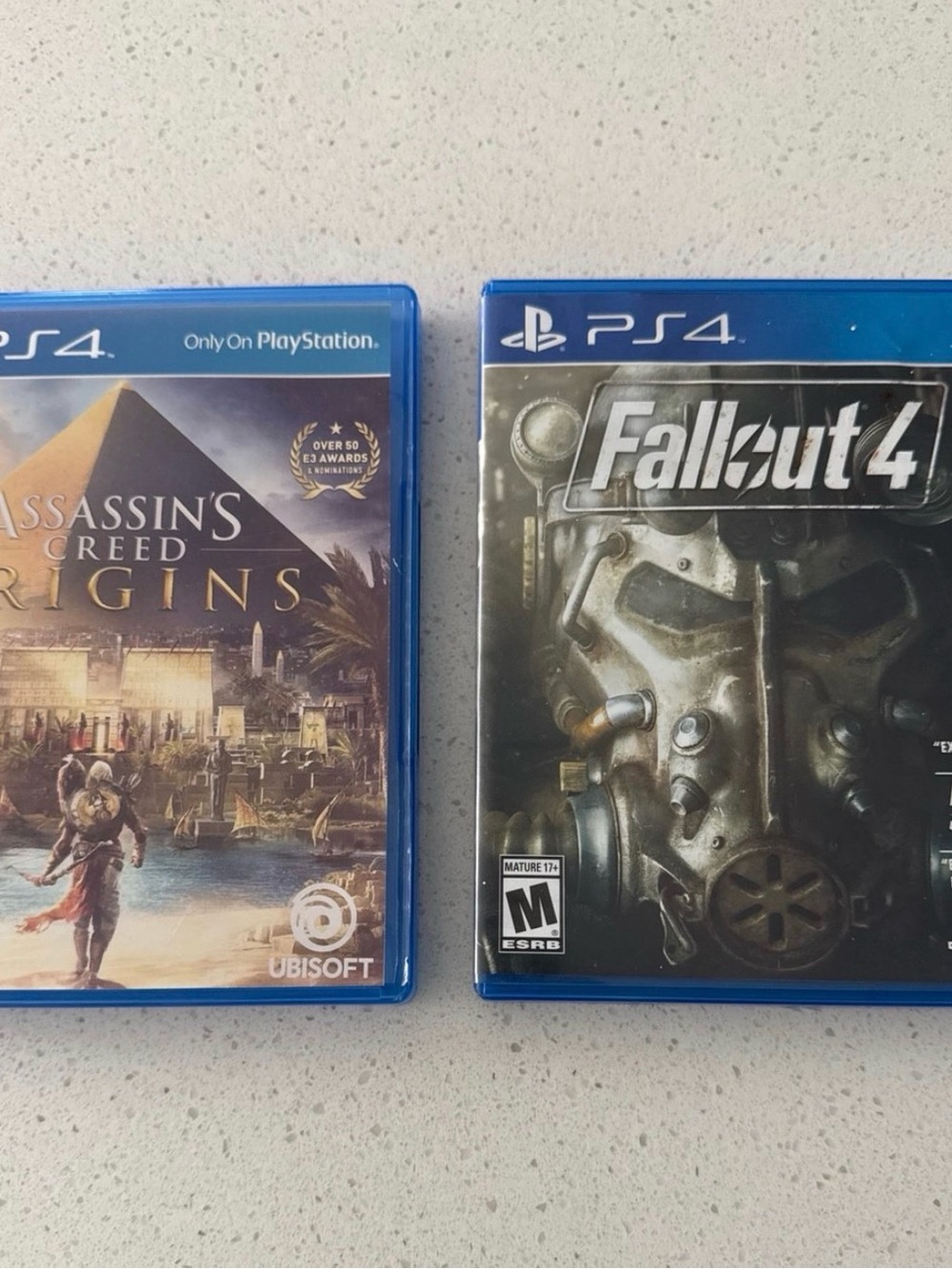 Sony PS4 Game Bundle - Assassin's Creed Origins & Fallout 4 (Blue Cases)